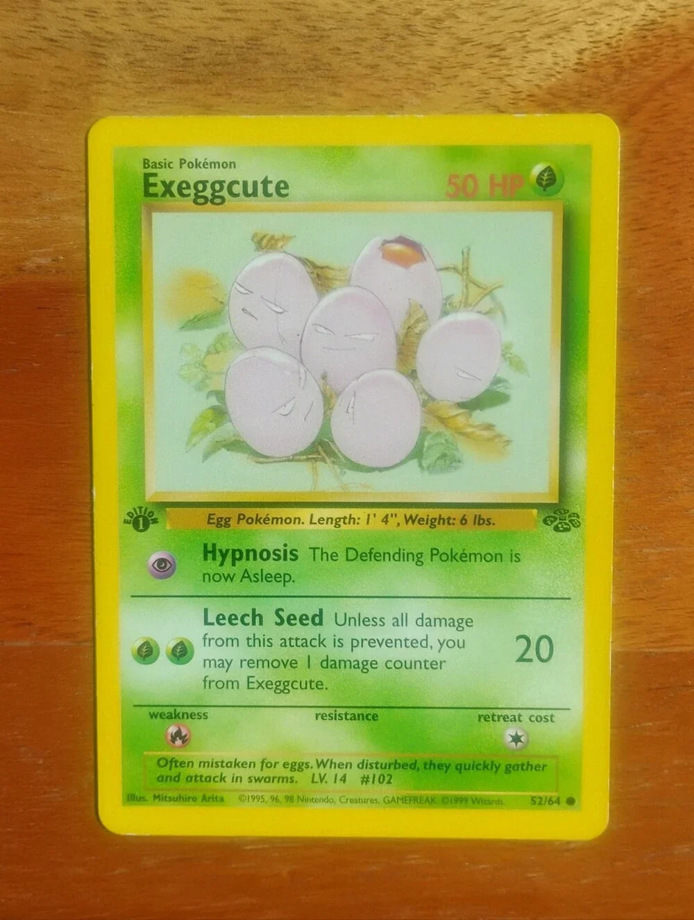 LP WOTC 1999 1st Edition Exeggcute 52/64 Jungle Set Pokemon Card